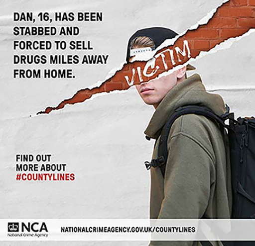 A poster showing a teenaged boy with the word ‘victim’ written across him.