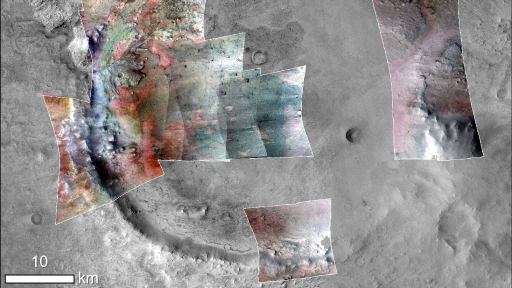 This figure is a greyscale image of the surface of Mars showing a circular impact crater. This is overlain with coloured panels in some areas. The colours range from red to blue, with reds and pinks mainly around the outside of the impact crater, and greens and blues inside the crater.