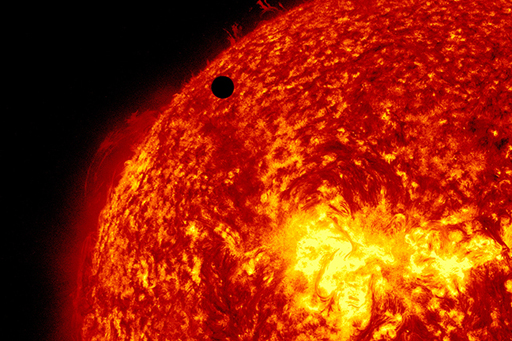 An image of Venus moving across the face of the Sun.