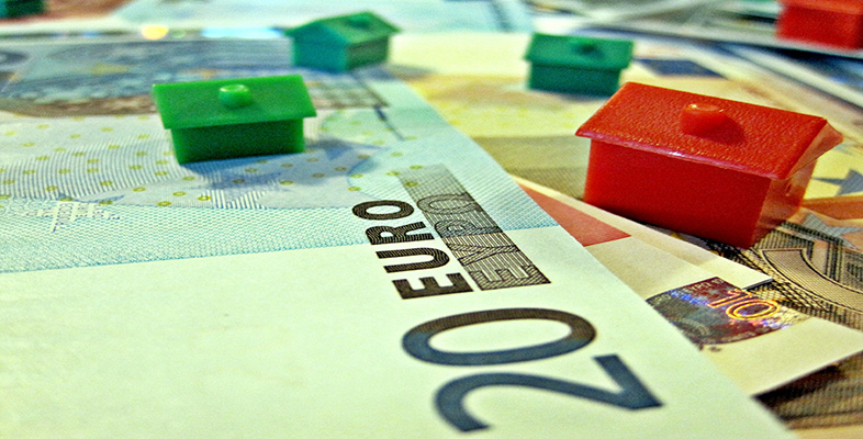 Euro notes with monopoly houses on