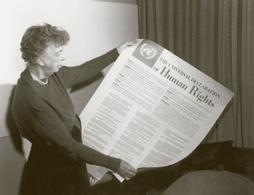 Eleanor Roosevelt, chair of the UN Human Rights Commission 1946 to 1951, holding a copy of the Universal Declaration of Human Rights