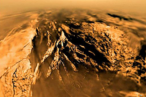 A view of Titan’s surface, seen during the parachute descent, by the Huygens lander.