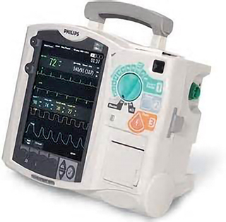 A colour photograph of a portable defibrillator used to treat heart attacks.