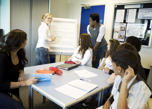 An image of a positive meeting, with everyone looking engaged.