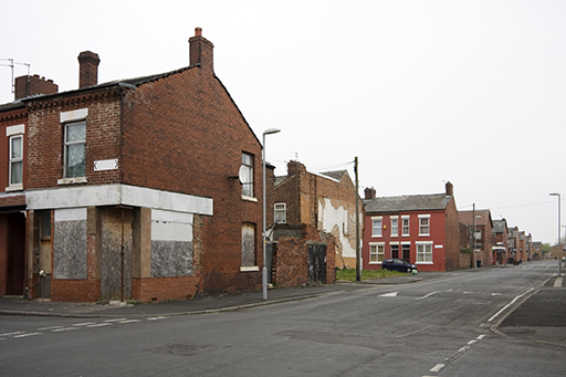 This is a photograph of some run-down houses.