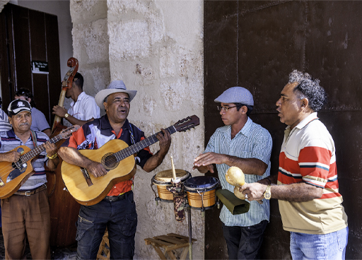 A photograph of street musicians in Havana