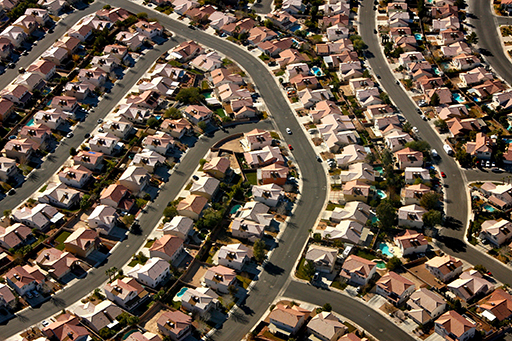 This is a photograph of a birds’ eye view of a group of houses.