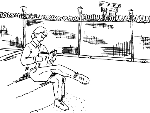 This is an illustration of a man in a prison compound, sitting on a bench reading a book