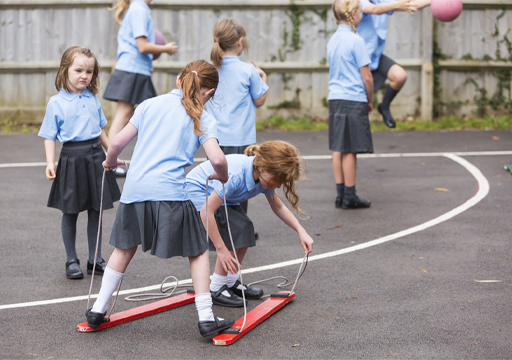 This is a photograph of children playing in a school playground.