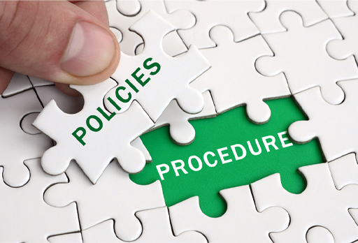 An image of a jigsaw piece labelled ‘Policies’ and a matching space in the puzzle as ‘Procedure’.