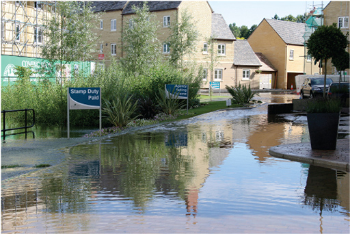 A photograph of flooding in a housing estate