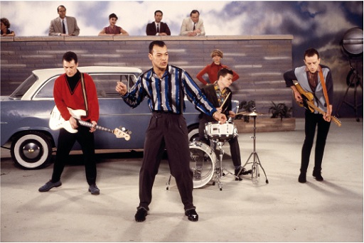 This is a photograph of Fine Young Cannibals performing.