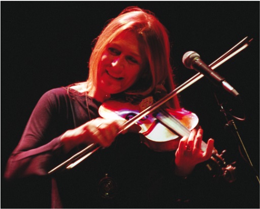 This is a photograph of Mairéad Ní Mhaonaigh performing.