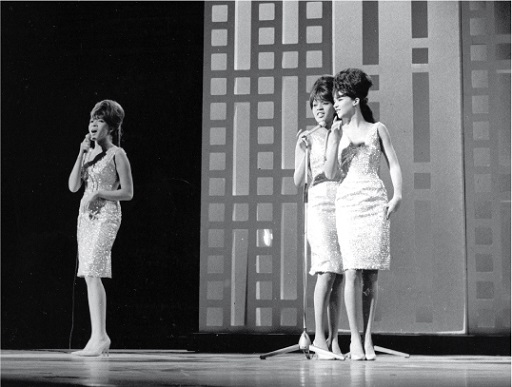 A photograph of The Ronettes on stage.