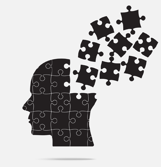 This is a graphic showing the profile of a person’s face. The face is made up of pieces of a jigsaw and some of the pieces are breaking away.
