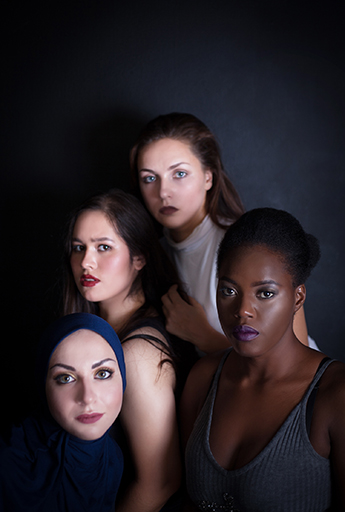 This is a photograph of four young women.