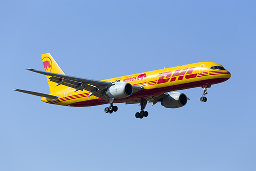 A DHL plane in the sky.