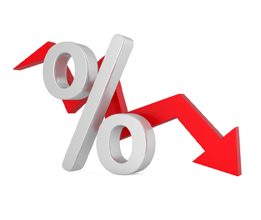The image is a large ‘%’ sign. Behind the sign is a thick line graph, moving up and down in level but with a clear downward trend.