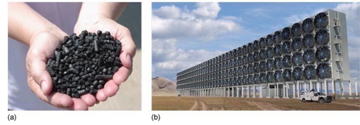 Figure 12 shows a photograph of 2 hands holding a pile of black charcoal pellets. Figure 12 shows a photograph of an array of large fans in a desert region making up a DAC plant. The arrays are stacked in long rows 4 high. A car is shown for scale, it's length is approximately twice the diameter of a fan.