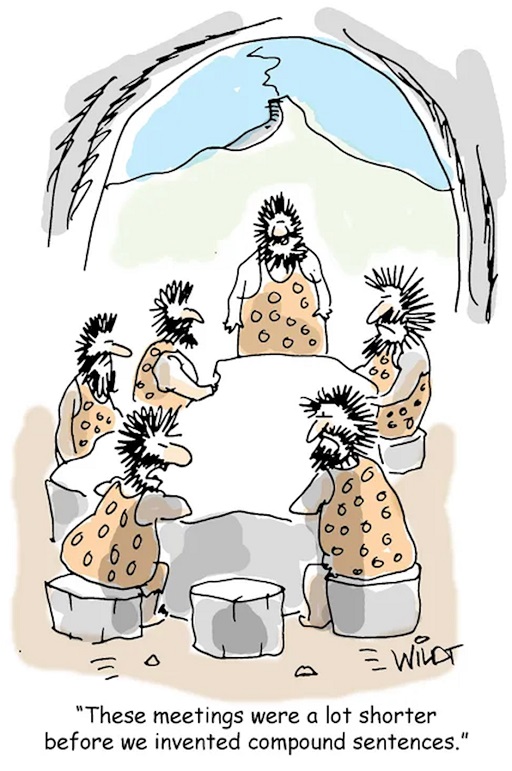 A cartoon showing a group of cavemen in a cave with the caption ‘These meetings were a lot shorter before we invented compound sentences’.