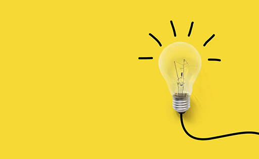 Lightbulb on a yellow background.