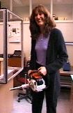 Dr Ellen Plaxman with chainsaw
