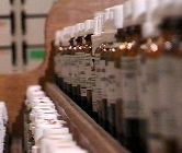 Line of homeopathic bottles of medicine