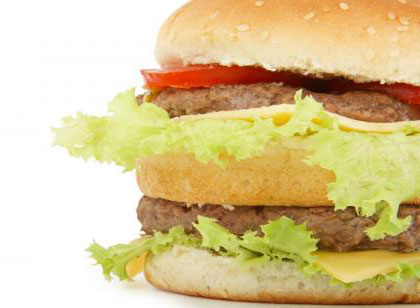 Closeup on hamburger isolated on white background