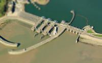 A tilt-shift photo of the Cardiff Bay Barrage