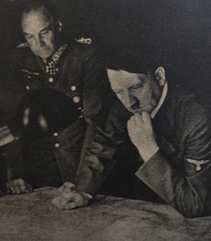 OKH commander Field Marshal Walther von Brauchitsch and Hitler, studies maps during the early days of Hitler's Russian Campaign