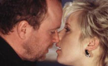 Hume would expect it: Phil Mitchell (Steve McFadden) kisses his sister-in-law (Letitia Dean) in EastEnders