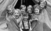 Children in tent - Corbis