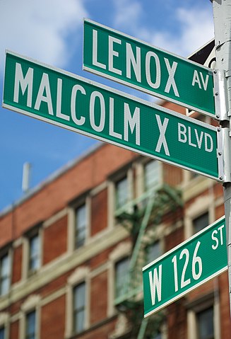 Street sign Malcolm X Boulevard and West 126th Street, Harlem, New York