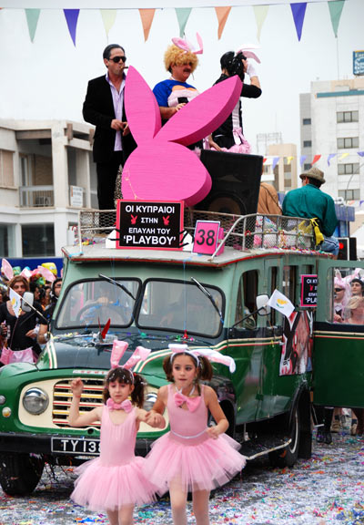 A Playboy-themed bus in a Limassol carnival parade