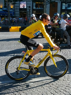 Bradley Wiggins wearing his Tour De France winner's yellow jersey