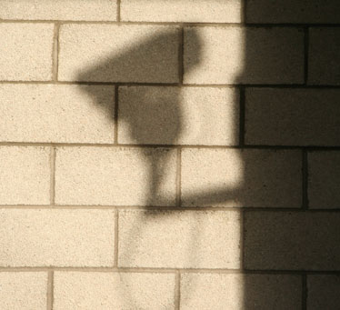 A shadow of a CCTV camera