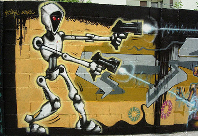 Wall graffitti of a robot with laser guns