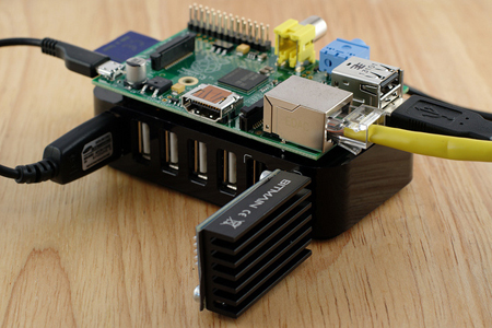 A photo to illustrate Bitcoin mining with the Raspberry Pi, using an AntMiner U2.