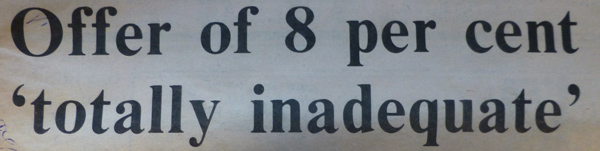 Image of a newspaper headline reading 'offer of 8 per cent totally inadequate'