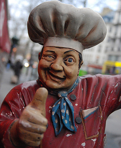 French Chef statue outside Au Petit Duc