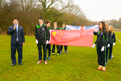 Students taking part in PE with a Chinese school teacher (BBC programme use only)