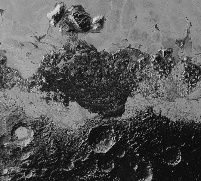 View, 350km wide, including a dark area at the south-western edge of Tombaugh Regio.