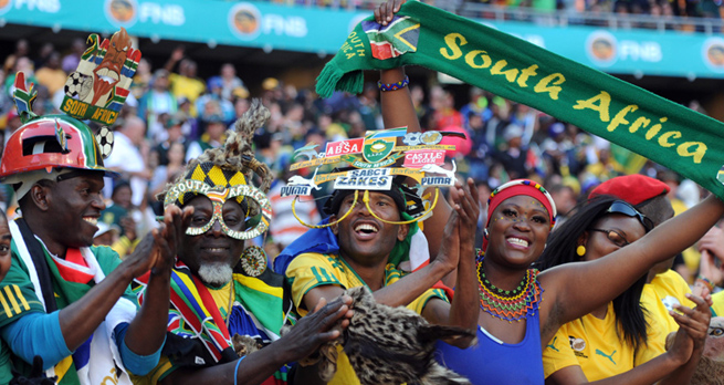 Fans celebrate Springboks win against Argentina during the Nelson Mandela Sport and Culture Day held at FNB Stadium, 2013