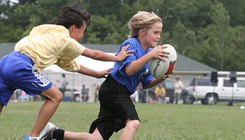 children playing rugby