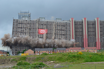 The first of the Red Road Flats being demolished in Glasgow in 2012