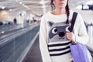 Woman in a raccoon jumper
