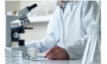 Scientist conducting research with microscope 