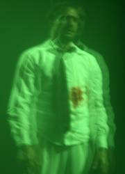 science fiction man in green light with bloodshot no ats