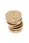 A stack of british pound coins on a white background