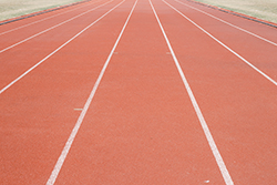 Image of an orange athletics racetrack